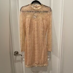 Lace long sleeve mini dress by Bebe